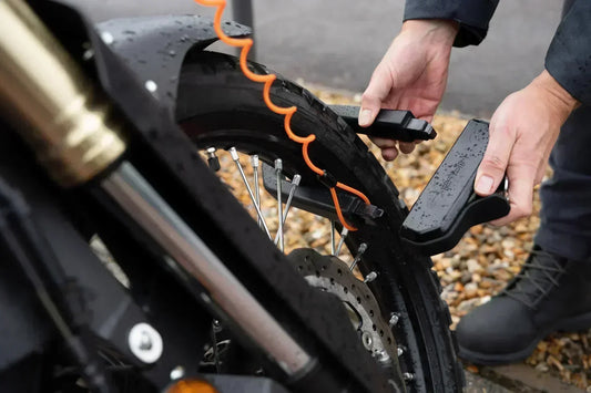 Motorcycle being secured with a Hiplok D1000 anti-angle-grinder D lock